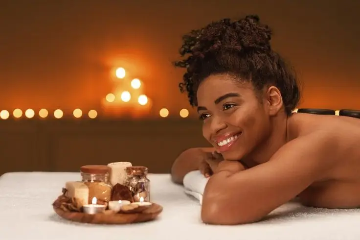 Closeup of happy woman getting massa